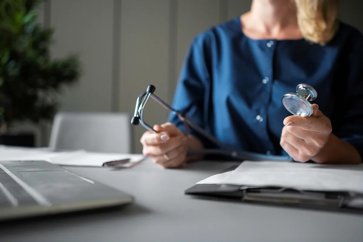 Professional reviewing medical documents